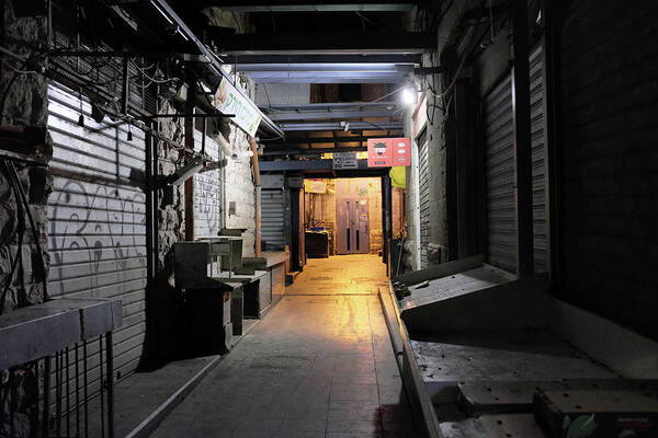 Night Time Art Print featuring the photograph An Alley in Mahane Yehuda Market by Dubi Roman