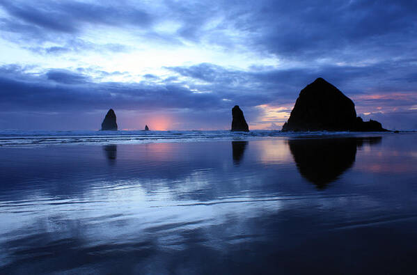 Cannon Beach Oregon Art Print featuring the photograph Blue Reflections by Kami McKeon
