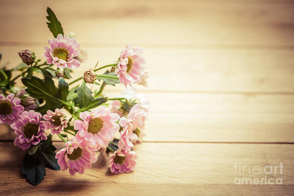 Flowers Art Print featuring the photograph Bouquet of fresh spring flowers on rustic wood by Michal Bednarek