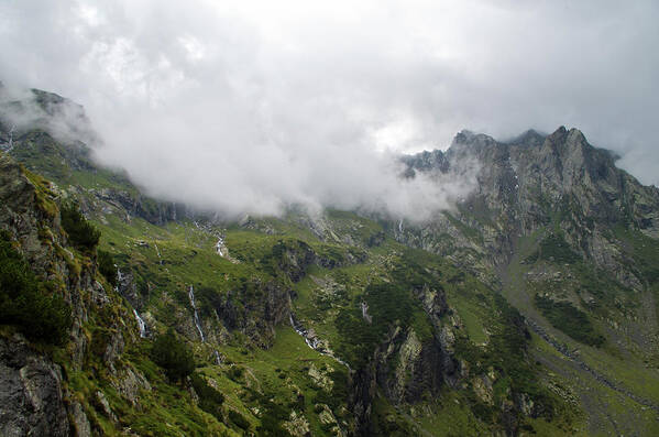 Mountain Art Print featuring the photograph Clouds on the top of the mountain by Nicola Aristolao