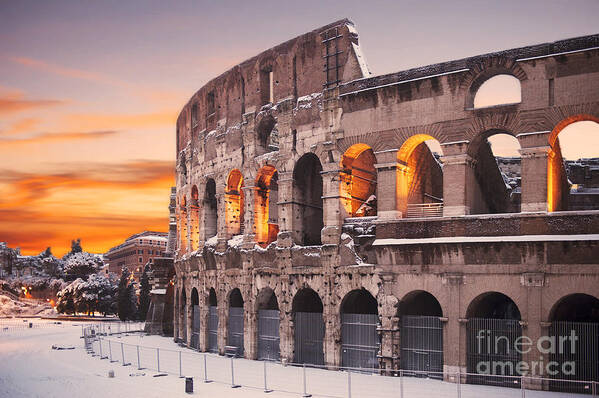 Colosseum Sunset Art Print featuring the photograph Colosseum covered in snow at sunset by Stefano Senise