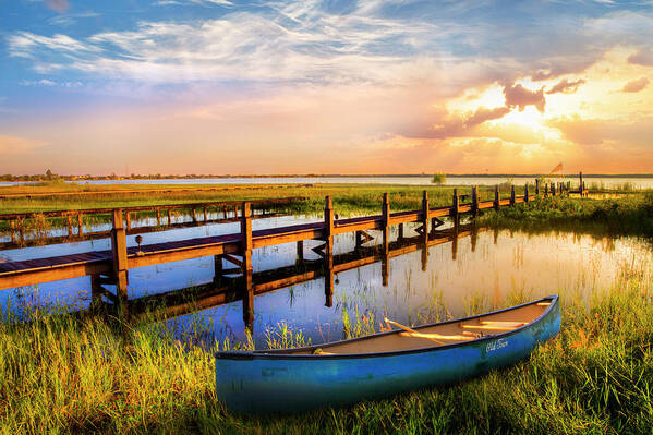 Boats Art Print featuring the photograph Evening Light on the Lake by Debra and Dave Vanderlaan