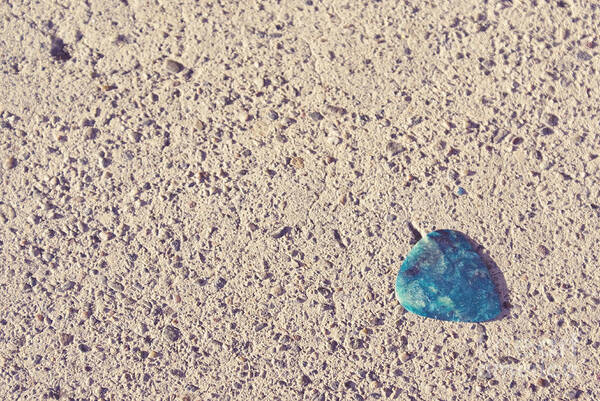 Guitar Pick Art Print featuring the photograph Guitar pick on sidewalk by Cindy Garber Iverson