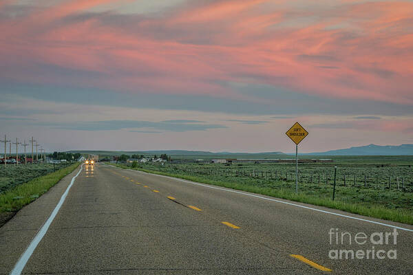 Colorado Art Print featuring the photograph highway at dusk in Colorado by Marek Uliasz