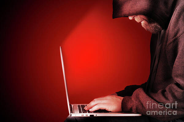 Computer Art Print featuring the photograph Hooded computer hacker red background by Simon Bratt
