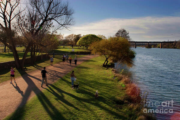 This Beautiful Gravel Pathway Circles Town Lake. And Is Very Popular For Off-road Bicycling Art Print featuring the photograph Lake Austin hike and bike trail make a runners paradise in austin texas by Dan Herron