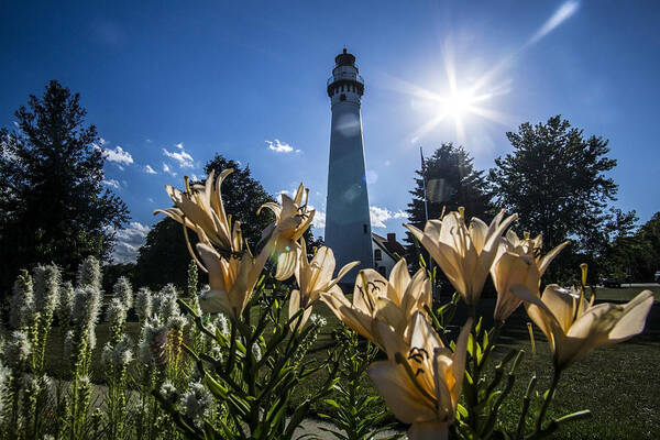 Wind Point Lighthouse Art Print featuring the photograph Lighthouse with a flowery foreground by Sven Brogren