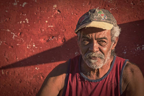 Joan Carroll Art Print featuring the photograph Man in Trinidad Cuba by Joan Carroll