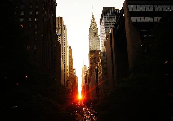Sunset Art Print featuring the photograph Manhattanhenge Sunset Over the Heart of New York City by Vivienne Gucwa