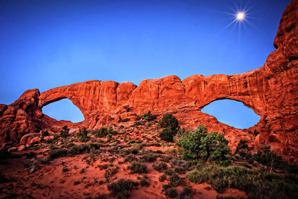 Arches Art Print featuring the photograph Moon Flares Over Windows by Mike Stephens