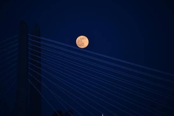 Moon Art Print featuring the photograph Moon over Bridge by Jerry Cahill