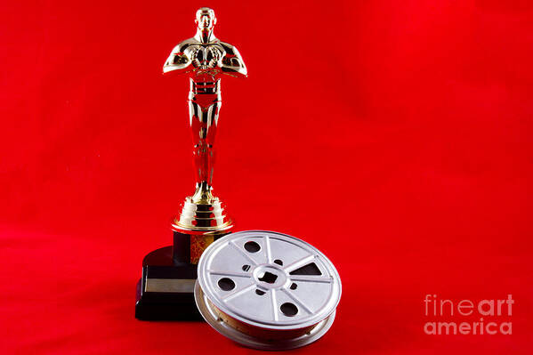 Academy Art Print featuring the photograph Oscar Statuette with Movie Reel by Karen Foley