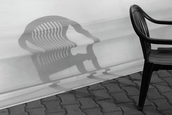 Chair Shadow Art Print featuring the photograph Plastic Chair Shadow 2 by Prakash Ghai