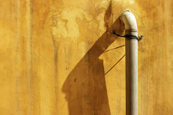 Minimal Art Print featuring the photograph Plastic Pipe and its Shadow on Brown Textured Wall by Prakash Ghai