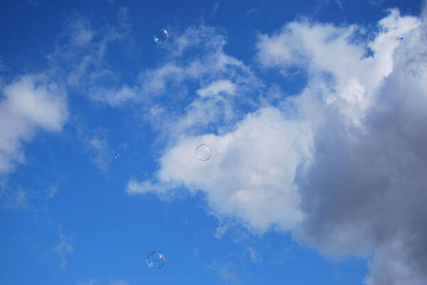 Bubbles Art Print featuring the photograph Playing with Clouds by Marilynne Bull