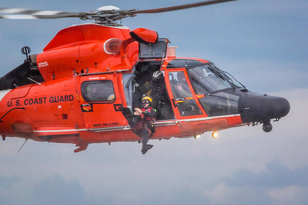 Us Coast Guard Art Print featuring the photograph Rescue Swimmer Jumps from Helicopter by Gregory Daley MPSA