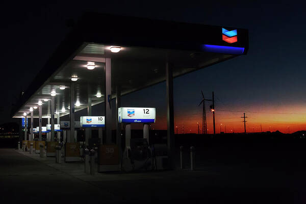 Filling Station Art Print featuring the photograph Running, to make the day last a little longer by Micah Offman