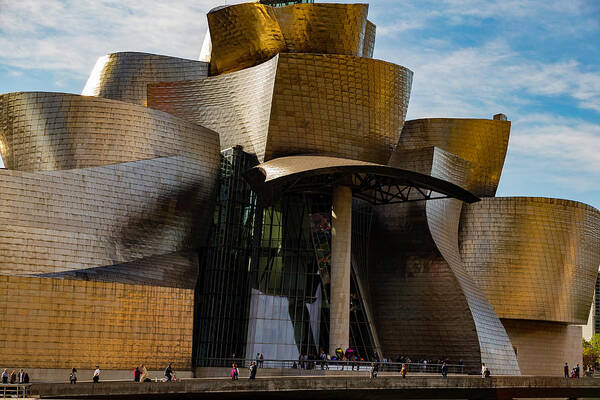 Spain Bilbao Guggenheim Museum Basque Country Frank Gehry Contemporary Architecture Nervion River City Daring And Innovative Curves Building Exterior Spectacular Building Deconstructivism Ferrovial Clad In Glass Art Print featuring the photograph The Guggenheim Museum Spain Bilbao by Andy Myatt