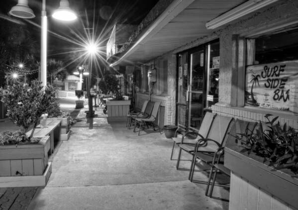 Surf Side Bar Art Print featuring the photograph Surf Side Bar At Night in Black and White by Greg and Chrystal Mimbs