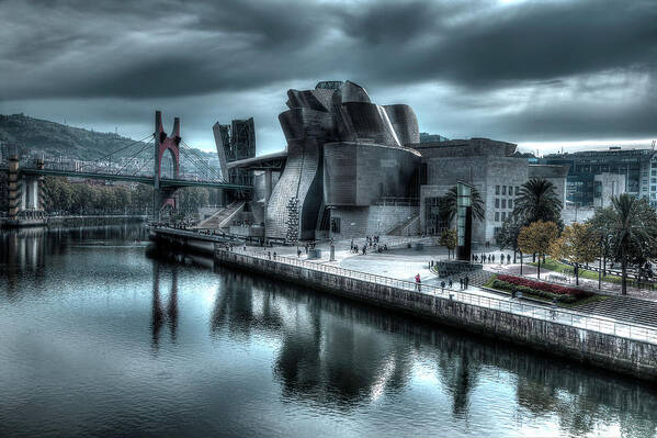 Spain Bilbao Guggenheim Museum Basque Country Frank Gehry Contemporary Architecture Nervion River City Daring And Innovative Curves Building Exterior Spectacular Building Deconstructivism Ferrovial Clad In Glass Art Print featuring the photograph The Guggenheim Museum Bilbao Surreal by Andy Myatt