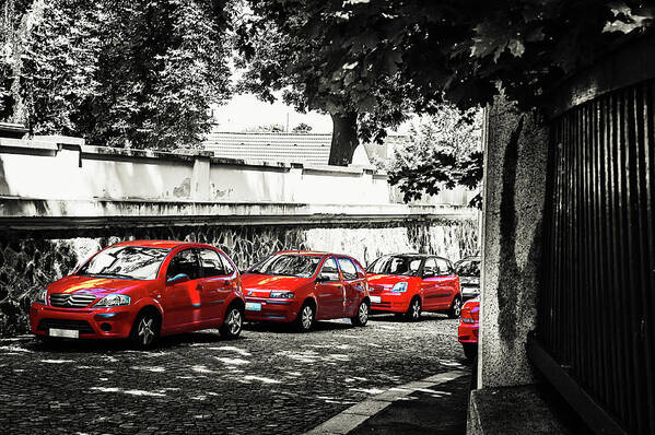Jenny Rainbow Fine Art Photography Art Print featuring the photograph The Street of Red Cars by Jenny Rainbow