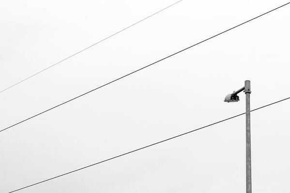 Minimal Art Print featuring the photograph Three Wires and a Street Lamp by Prakash Ghai