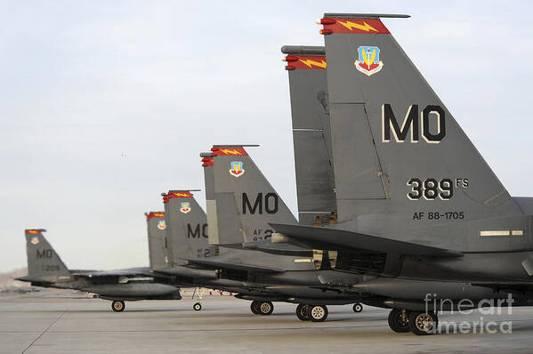 Airdrome Art Print featuring the photograph U.s. Air Force F-15e Strike Eagles Taxi by Stocktrek Images