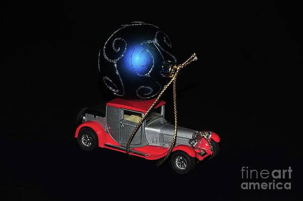 Object Art Print featuring the photograph Vintage car carrying Christmas ornament by Akshay Thaker