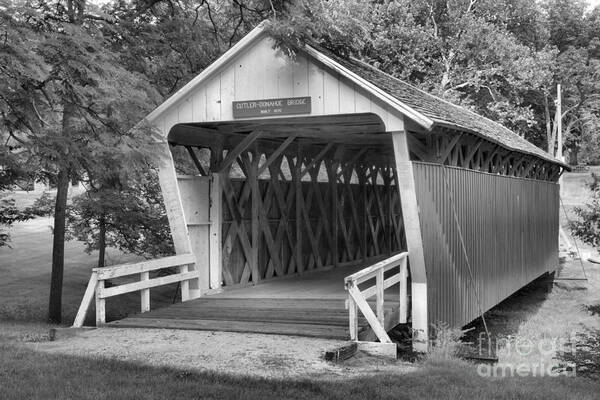 Cutler Donahoe Covered Bridge Art Print featuring the photograph Winterset Iowa Covered Bridge Black And White by Adam Jewell