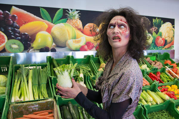 Zombie Art Print featuring the photograph Zombie woman shopping vegetables by Matthias Hauser