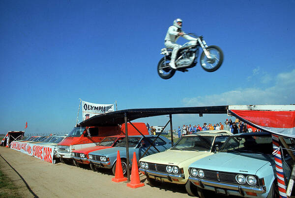 Helmet Art Print featuring the photograph Evel Knievel In Flight #1 by Ralph Crane