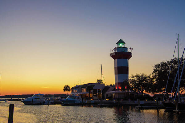 Maritime Art Print featuring the photograph Harbour Town Lighthouse At Sunset #1 by Dennis Schmidt