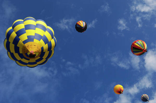 Taking Off Art Print featuring the photograph Hot Air Balloons, Sky And Clouds #1 by Gomezdavid