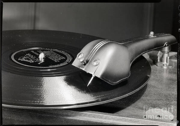 1930-1939 Art Print featuring the photograph Phonograph Needle On A Record #1 by Bettmann