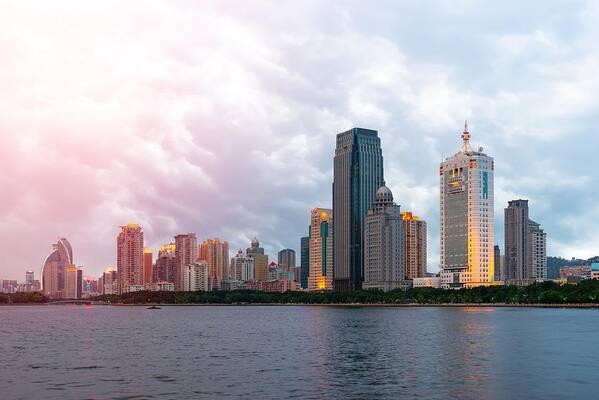 Landscape Art Print featuring the photograph Xiamen, China Skyline On Yundang Lake #1 by Sean Pavone