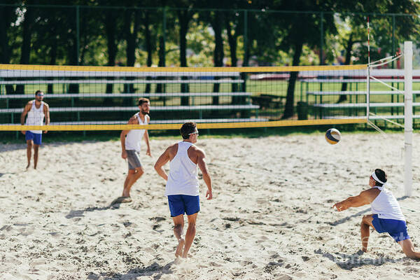 Beach Volleyball Art Print featuring the photograph Beach Volleyball Game #2 by Microgen Images/science Photo Library