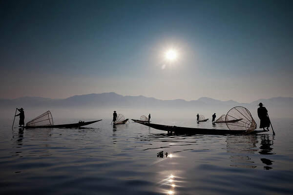 Tranquility Art Print featuring the photograph Fishermen On Inle Lake, Myanmar #2 by Mint Images - Art Wolfe