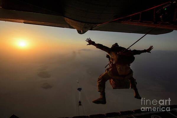 People Art Print featuring the photograph A U.s. Air Force Pararescueman Jumps #3 by Stocktrek Images