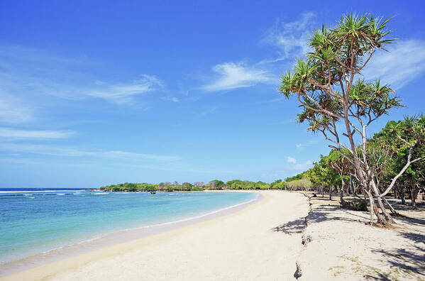Tranquility Art Print featuring the photograph A Deserted Beach At Nusa Dua by Tom Bonaventure