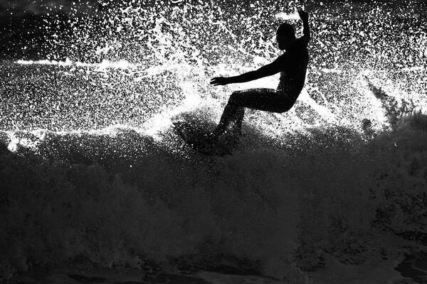 People Art Print featuring the photograph A Male Surfer Does A Floater Over A by Kyle Sparks