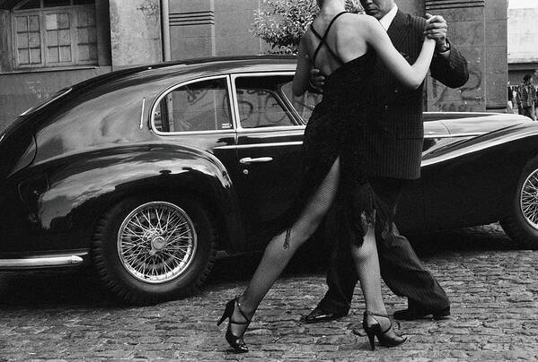 Heterosexual Couple Art Print featuring the photograph Argentina, Couple Dancing Tango By Car by Christopher Pillitz