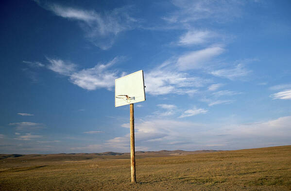 Globalization Art Print featuring the photograph Basketball Backboard And Hoop On Rural by Peter Adams