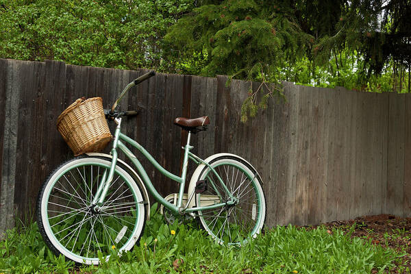 Tranquility Art Print featuring the photograph Bicycle With Wooden Fence by Jeffrey Kaphan