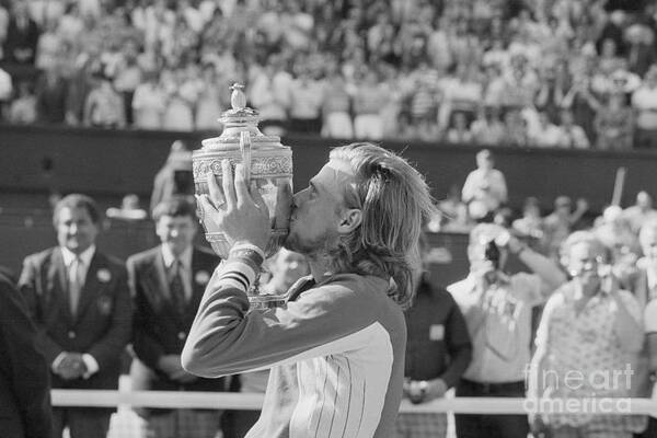 Tennis Art Print featuring the photograph Bjorn Borg Holding Wimbledon Trophy by Bettmann
