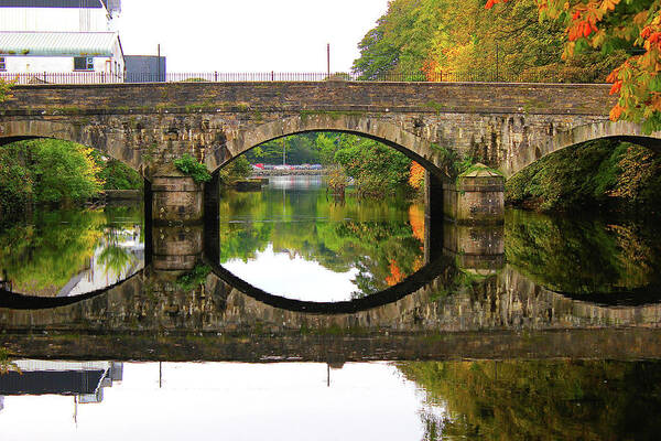 Bridge Art Print featuring the photograph Bridge and reflection over River Eske in Donegal Ireland by Toni and Rene Maggio