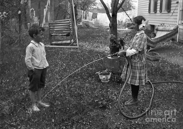 Hose Art Print featuring the photograph Children 6-7 Years Playing With Hose by Bettmann