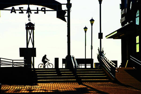 Bicycle Art Print featuring the photograph Cyclist at sunrise, Ocean City boardwalk by Bill Jonscher