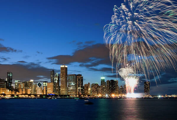 Water's Edge Art Print featuring the photograph Fireworks Exploding Over Chicago by Chrisp0