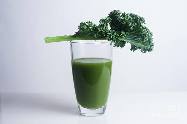 Horizontal Art Print featuring the photograph Fresh Kale Leaf And A Glass Of Green Juice by Cristina Pedrazzini/science Photo Library