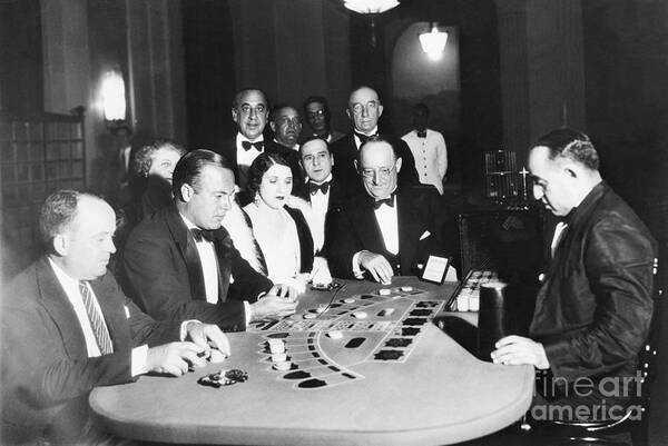 Mature Adult Art Print featuring the photograph Gamblers Playing Cards At Havana Casino by Bettmann